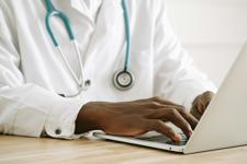 Doctor Using A Computer