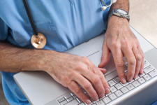 Doctor using laptop (1)