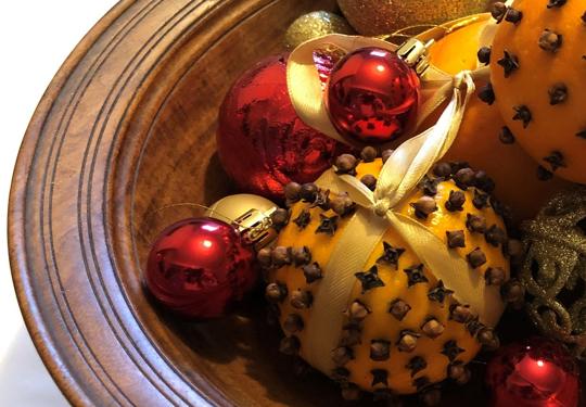 Bowl Filled With Chrismas Baubles And Pomanders