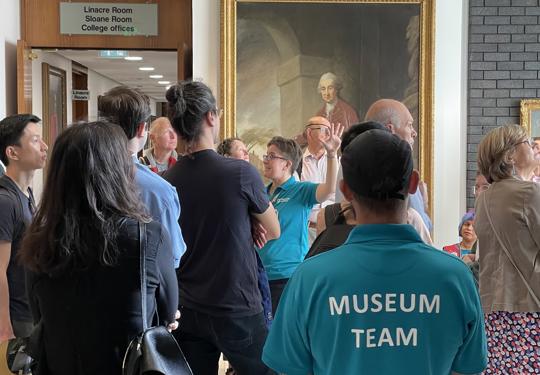 A Tour Group listening to a guide at the RCP