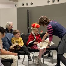Storyteller with a group of children