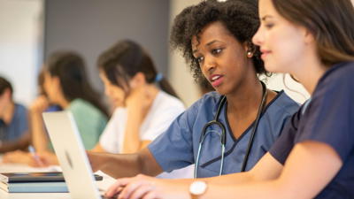 Two Doctors Studying Together