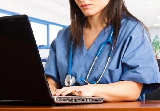 Doctor using laptop (2)